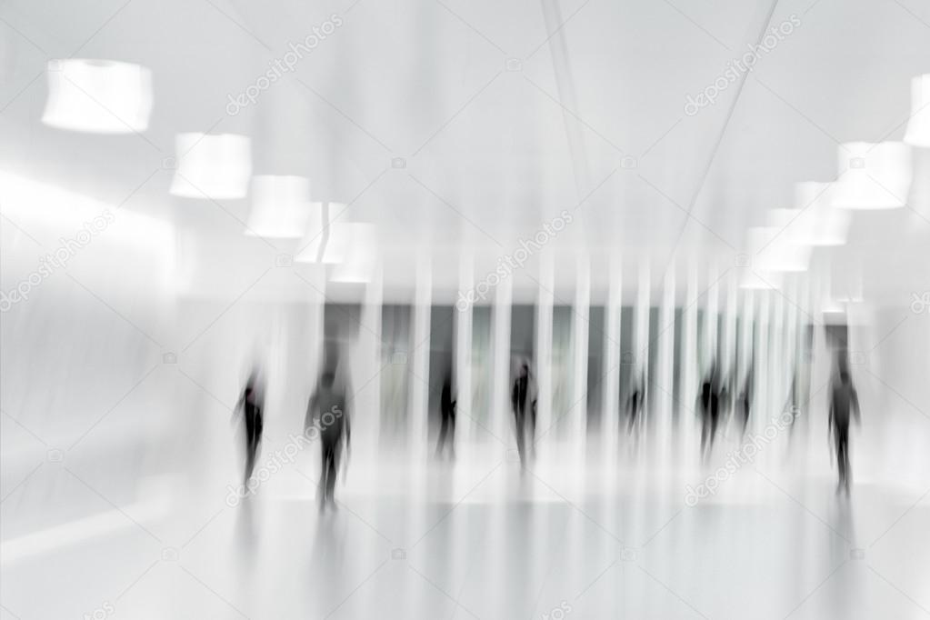 group of people in the lobby business center and blue tonality