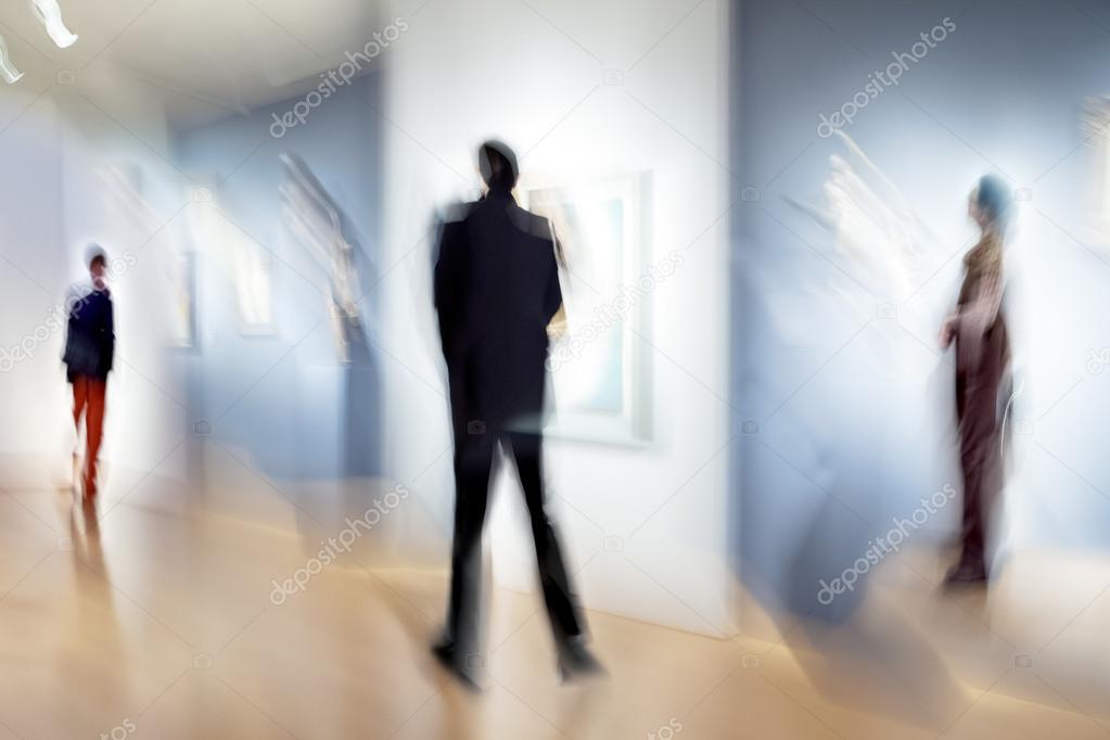 people in the art gallery center