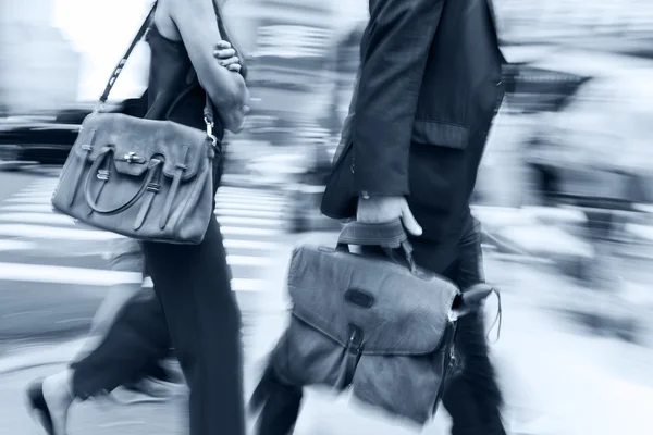 Group of business people in the street and blue tonality — Stock Photo, Image