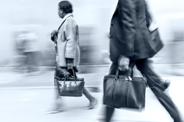 Group of business people in the street and blue tonality — Stock Photo, Image