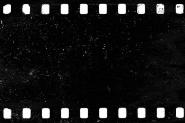 Tozlu ve pis 35mm film dokusu ya da yüzeyi. Eski grunge tasarımı için toz parçacığı ve tahıl dokusu veya film çerçeve efektini kaplamak için toprak kullanımı. 