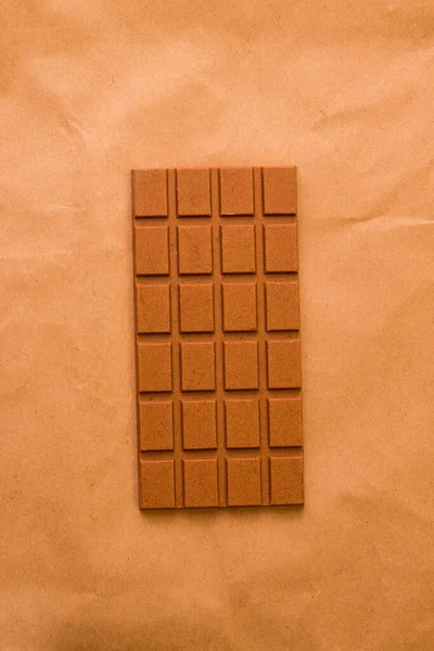 Chocolate Leite Fundo Marrom Vista Cima Fotografia Monocromática Minimalismo — Fotografia de Stock