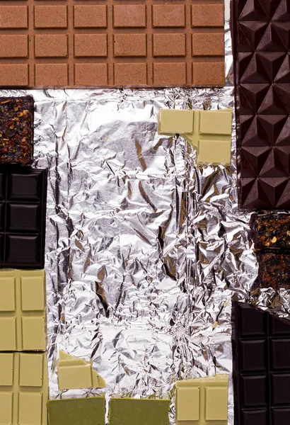 Diferentes Tipos Chocolate Una Envoltura Papel Aluminio Copiar Espacio Vista — Foto de Stock