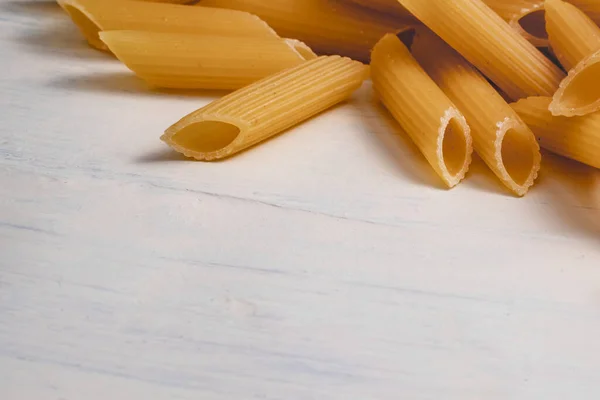 Raw Dry Uncooked Penne Pasta Bowl White Background Good Basil — Stock Photo, Image