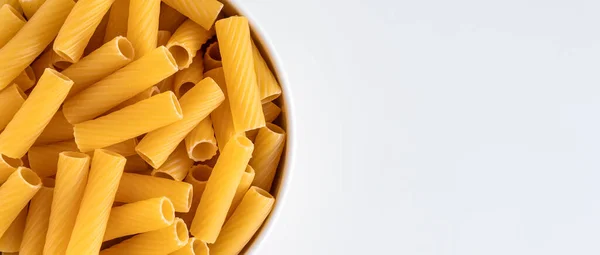 Raw Dry Uncooked Tortiglioni Pasta Spaghetti Noodle White Bowl Wooden — Stock Photo, Image