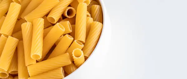 Raw Dry Uncooked Tortiglioni Pasta Spaghetti Noodle White Bowl Wooden — Stock Photo, Image