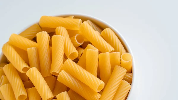 Raw Dry Uncooked Tortiglioni Pasta Spaghetti Noodle White Bowl Wooden — Stock Photo, Image