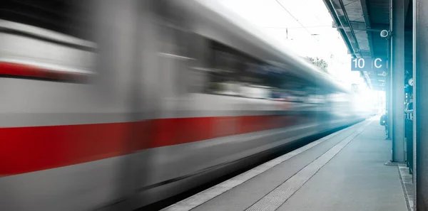 Abstract background travel of public transportation with blur speed motion movement of train on railway tunnel subway