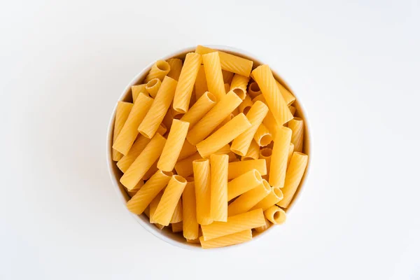 Raw Dry Uncooked Tortiglioni Pasta Spaghetti Noodle White Bowl Wooden Royalty Free Stock Photos