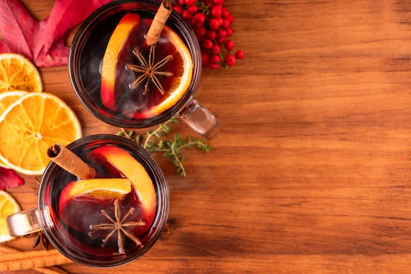 German tradition winter Christmas market new year holidays festival drink Gluhwein Mulled sweet hot warm red Wine with spices citrus aromatic cinnamon star anise