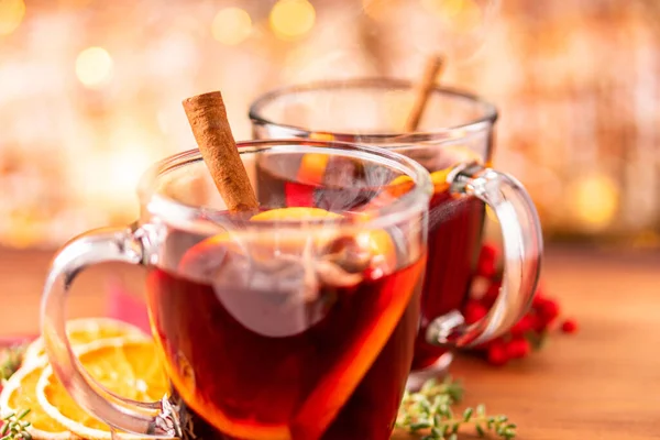 German tradition winter Christmas market new year holidays festival drink Gluhwein Mulled sweet hot warm red Wine with spices citrus aromatic cinnamon star anise