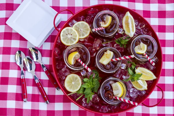 Iced Teas in Mason Jars on Ice