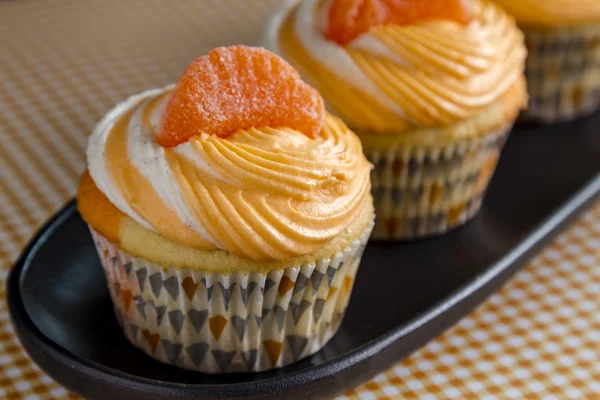 Naranja vainilla frijol remolinado cupcakes —  Fotos de Stock