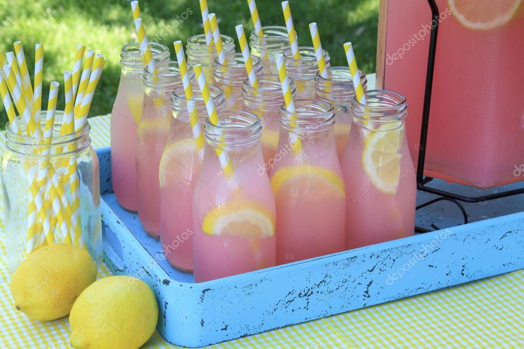 Close Up Of Picnic Party In The Park Drink Table With Large