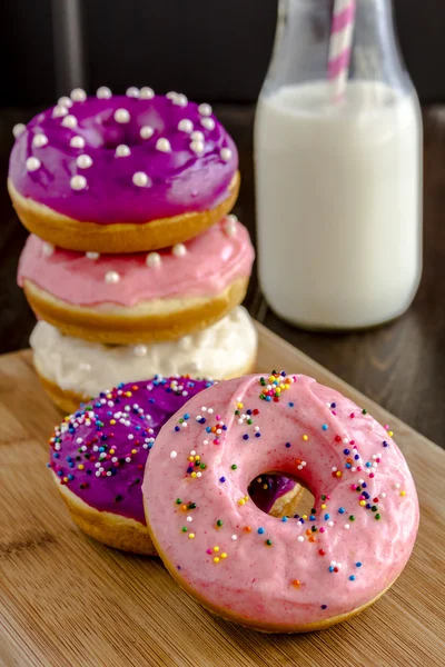 Fresh Baked Vanilla Bean Iced Doughnuts — Stock Photo, Image