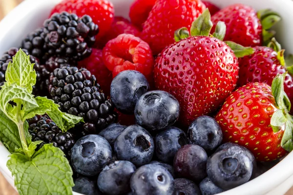 Bowl Filled with Fresh Organic Berries Stock Photo
