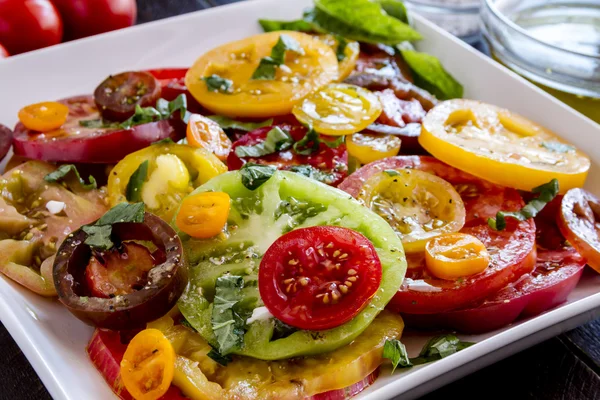 Scheiben reifer Tomatensorten — Stockfoto