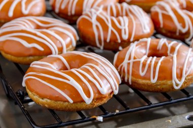 Homemade Baked Pumpkin Donuts with Glaze clipart