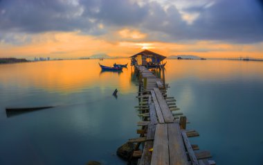 Uzun pozlama çekim gündoğumu uzun iskelede Balık tutma