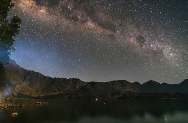 Scenery of Milky Way at Rinjani Mountain. Soft Focus, Visible Noise due to Long Exposure and High ISO — Stock Photo, Image