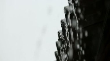 Rain running down from the roof