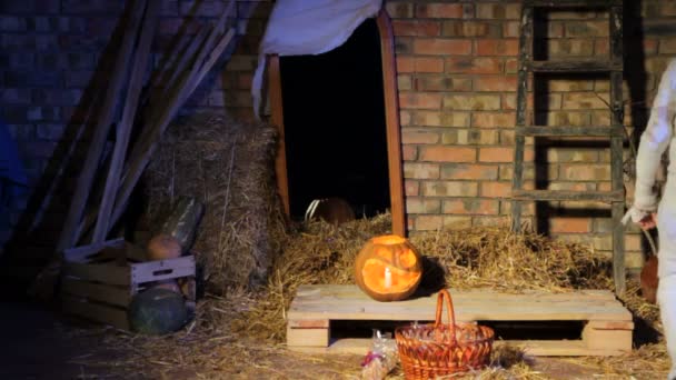 Halloween ghost picks up present off — Stockvideo