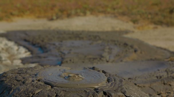 Gray Mud Slowly Erupting Out Of Active Volcano — Stock Video