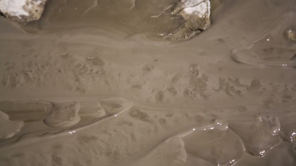 Grey Mud Flowing Out Of Active Diaper Volcano — Stock Video