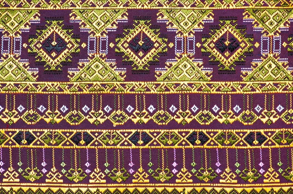 Colorful thai silk handcraft peruvian style rug surface old vintage torn conservation Made from natural materials Chemical free close up silk background silk texture — Stock Photo, Image