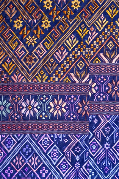 Colorful thai silk handcraft peruvian style rug surface old vintage torn conservation Made from natural materials Chemical free close up silk background silk texture — Stock Photo, Image