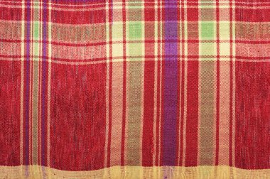 100 yıldan daha eski renkli Tayland el sanatları Peru tarzı halı yüzeyi. Doğal malzemelerden yapılmış eski, yırtık, kimyasal malzemelerden yapılmış. Yakın çekim..