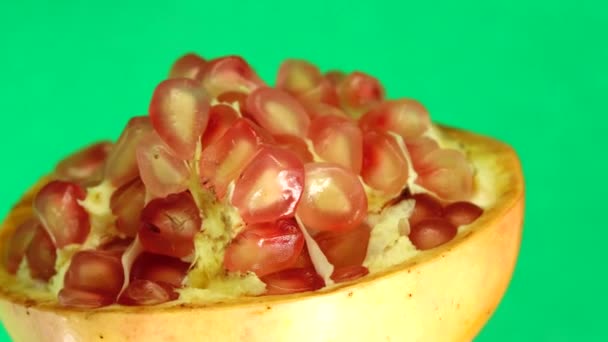 Organic Healthy Red Fruit Close Open Pomegranate Fruit Rotates Green — Stock Video