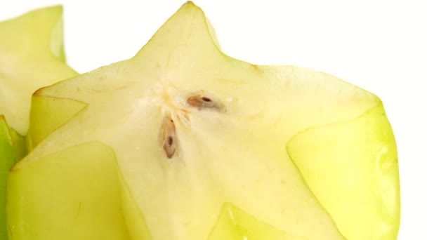 Βιολογικής Αστέρι Φρούτα Carambola Αστέρι Μήλο Starfruit Close Περιστρέφεται Λευκό — Αρχείο Βίντεο