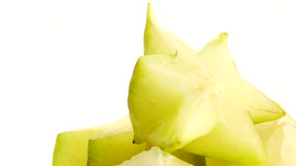 유기농 Carambola Star Apple Starfruit Close 배경에서 회전한다 — 비디오