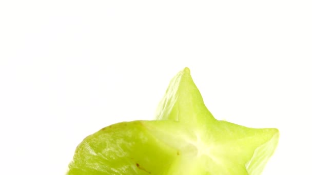 Βιολογικής Αστέρι Φρούτα Carambola Αστέρι Μήλο Starfruit Close Περιστρέφεται Λευκό — Αρχείο Βίντεο