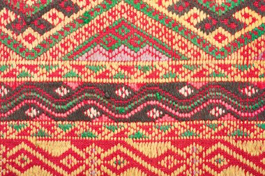 Kimyasal ücretsiz 60 yıldan daha eski renkli Tay Perulu stil halı yüzey eski vintage yırtık koruma Made doğal malzemelerden elişi yakın çekim.
