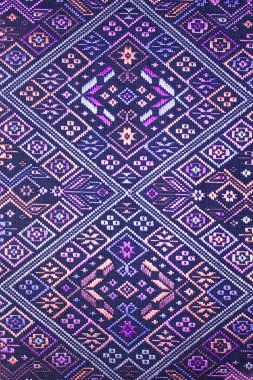 Kimyasal ücretsiz 60 yıldan daha eski renkli Tay Perulu stil halı yüzey eski vintage yırtık koruma Made doğal malzemelerden elişi yakın çekim.