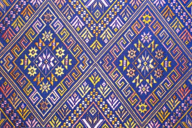 Kimyasal ücretsiz 60 yıldan daha eski renkli Tay Perulu stil halı yüzey eski vintage yırtık koruma Made doğal malzemelerden elişi yakın çekim.
