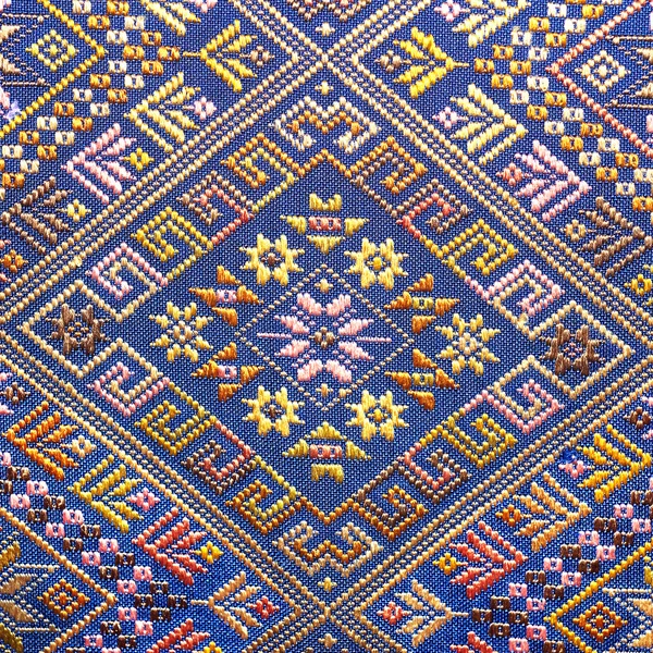 More than 60 years old colorful thai handcraft peruvian style rug surface old vintage torn conservation Made from natural materials Chemical free close up. — Stock Photo, Image