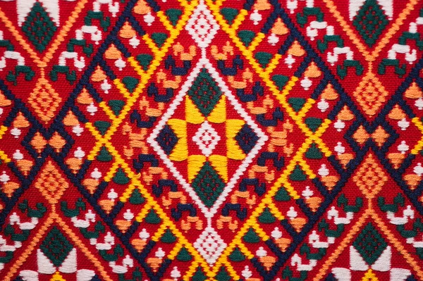 Colorful thai handcraft peruvian style rug surface close up. More of this motif & more textiles peruvian stripe beautiful background tapestry persian nomad detail pattern arabic fashionable textile. — Stock Photo, Image