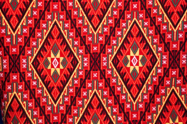 Colorful thai handcraft peruvian style rug surface close up. More of this motif & more textiles peruvian stripe beautiful background tapestry persian nomad detail pattern arabic fashionable textile. — Stock Photo, Image