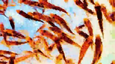 Canlı küçük balıklar dinamik bir şekilde berrak suda yüzüyor, parlak sarı ve mavi tonlarla soyut bir hareket bulanıklığı yaratıyor, yaşamı ve enerjiyi sembolize ediyor..