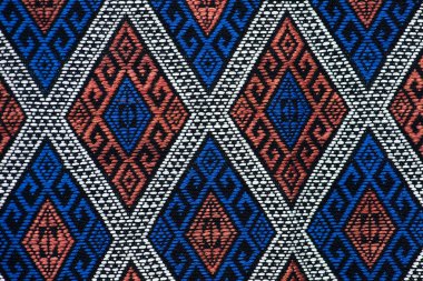 Colorful thai silk handcraft peruvian style rug surface close up More this motif & more textiles peruvian stripe beautiful background tapestry persian nomad detail pattern farabic fashionable textile. clipart