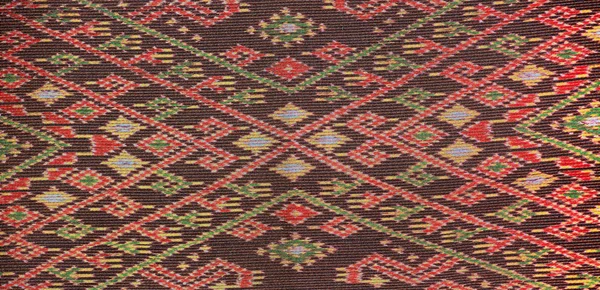 Bunte thailändische Seide Handarbeit peruanischen Stil Teppichoberfläche Nahaufnahme mehr dieses Motiv & mehr Textilien peruanischen Streifen schönen Hintergrund Wandteppich persischen Nomaden Detail Muster farabic modisches Textil. — Stockfoto