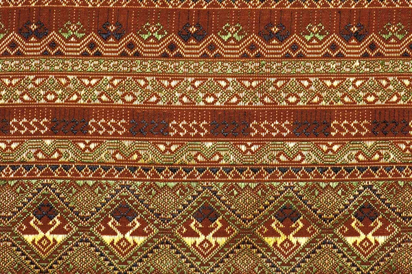 Színes thai selyem kézműves perui stílus szőnyeg felszíni közel több, ez a motívum & több textil perui csíkos gyönyörű háttér gobelin perzsa nomád részletesen minta farabic divatos textil. — Stock Fotó