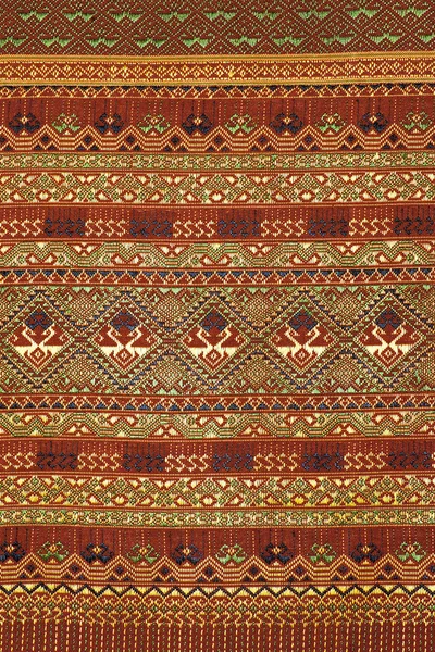 Colorful thai silk handcraft peruvian style rug surface close up More this motif & more textiles peruvian stripe beautiful background tapestry persian nomad detail pattern farabic fashionable textile. — Stock Photo, Image