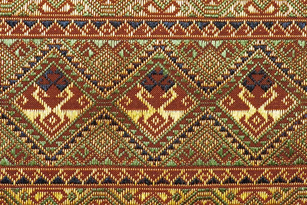 Colorido tailandés seda artesanía estilo peruano alfombra superficie de cerca Más este motivo y más textiles raya peruana hermoso fondo tapiz persa nómada detalle patrón farabic moda textil . — Foto de Stock