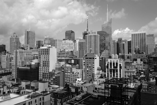 A view of buildings in midtown Manhattan in black and white.
