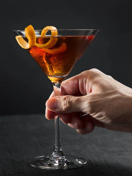 Man Hand Holding Cocktail Glass Orange Twist Manhattan Preparation — Stock Photo, Image