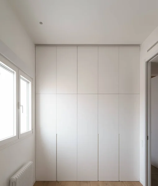 White panel luxury bedroom. Architectural restoration